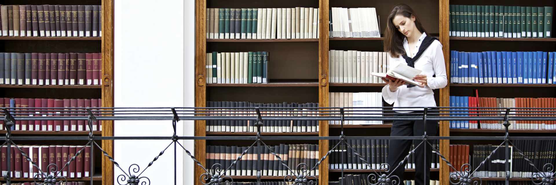 Young woman working in library
